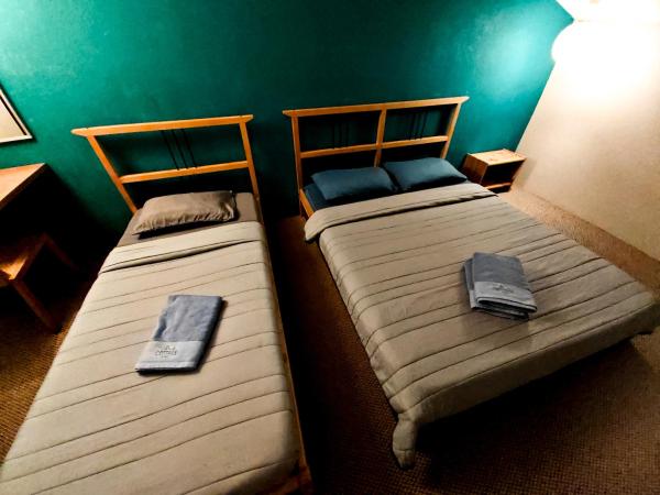 The Cottage Stay - self check-in : photo 4 de la chambre chambre triple Économique avec salle de bains commune