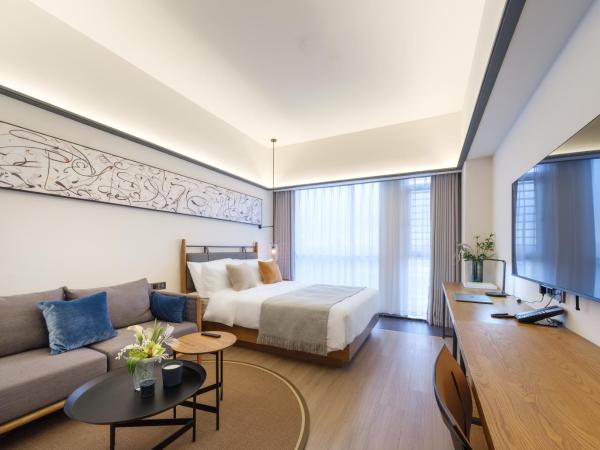 Shanghai T Plus Hotel Residence : photo 1 de la chambre chambre lit queen-size deluxe