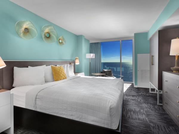 Crown Reef Beach Resort and Waterpark : photo 2 de la chambre suite lit king-size - vue sur océan