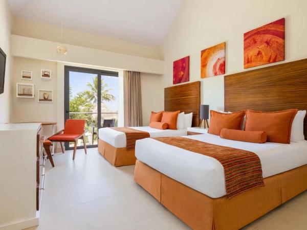 Sunscape Sabor Cozumel : photo 1 de la chambre hébergement double deluxe - vue tropicale