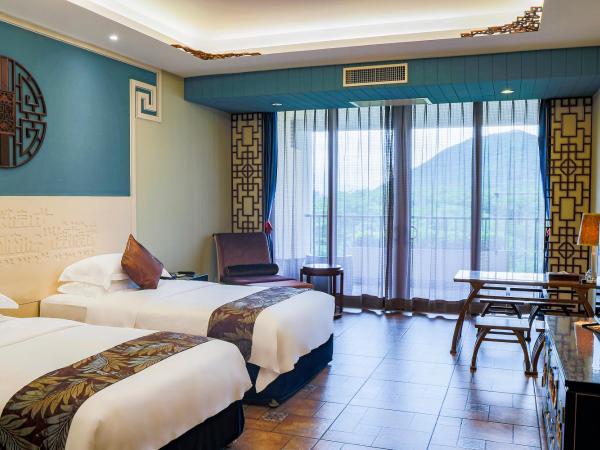 Luhuitou State Guesthouse & Resort : photo 1 de la chambre chambre lits jumeaux deluxe avec vue sur le jardin