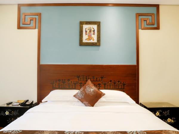 Luhuitou State Guesthouse & Resort : photo 1 de la chambre chambre lit king-size deluxe - vue sur mer