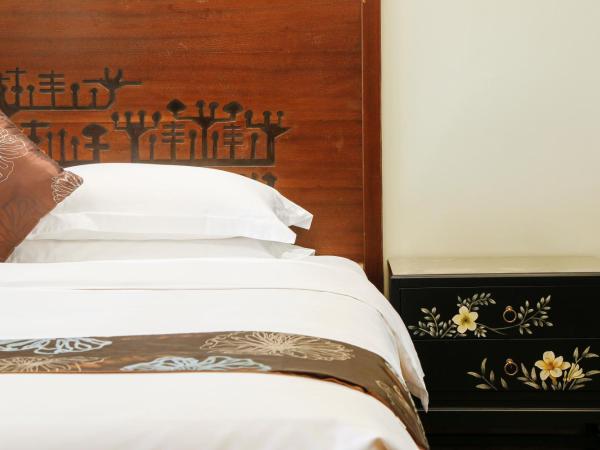 Luhuitou State Guesthouse & Resort : photo 4 de la chambre chambre lit king-size deluxe - vue sur mer