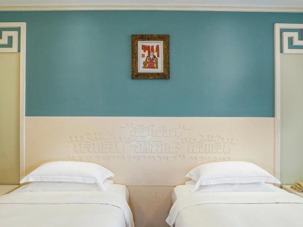 Luhuitou State Guesthouse & Resort : photo 3 de la chambre chambre lits jumeaux supérieure – vue sur jardin