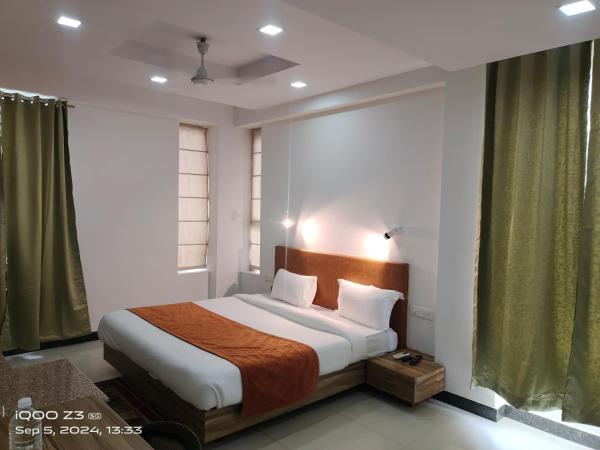 Pacific Inn Green, Gurgaon : photo 8 de la chambre chambre lit king-size deluxe