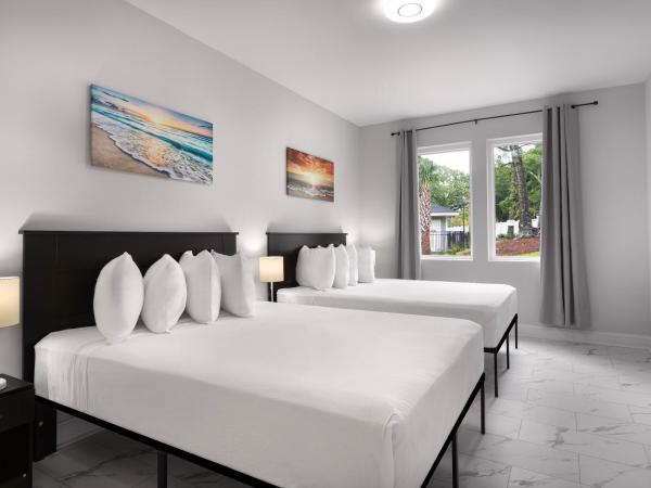 Ocean Escape Condos North : photo 8 de la chambre three-bedroom condo with balcony