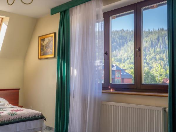 Willa Monte Rosa : photo 7 de la chambre hébergement quadruple de luxe