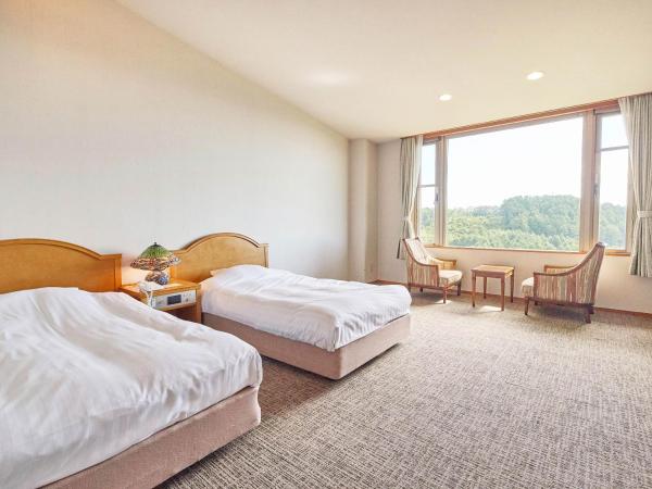 Arcadia : photo 1 de la chambre chambre lits jumeaux - vue sur montagne