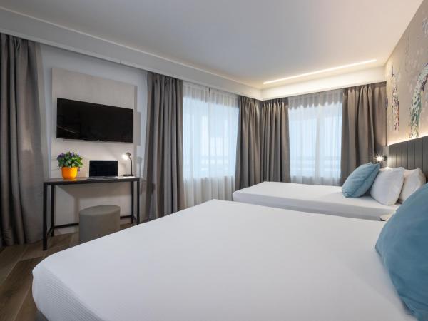 IH Hotels Milano Centrale : photo 7 de la chambre chambre supérieure avec 2 lits queen-size