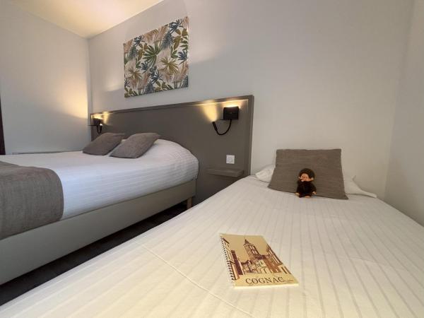 Hôtel Le Valois, Cognac Centre : photo 2 de la chambre chambre triple confort