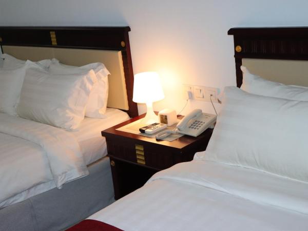 AL Amin Family Friendly Hotel : photo 9 de la chambre chambre triple Économique