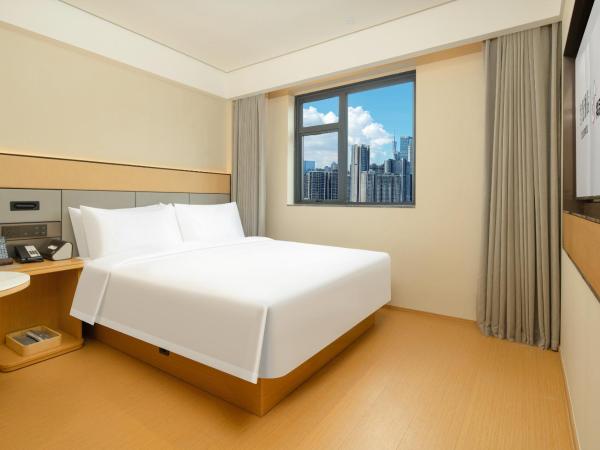 Yizhi Hotel - Guangzhou Taikoo Hui Plaza Shipaiqiao Subway Station Branch -Free shuttle bus for Canton Fair : photo 4 de la chambre chambre supérieure lit queen-size