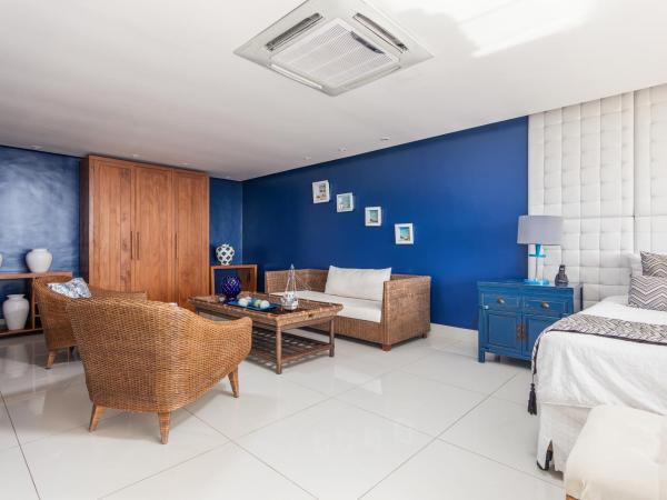 Costa do Sol Boutique Hotel : photo 7 de la chambre suite deluxe - vue sur mer