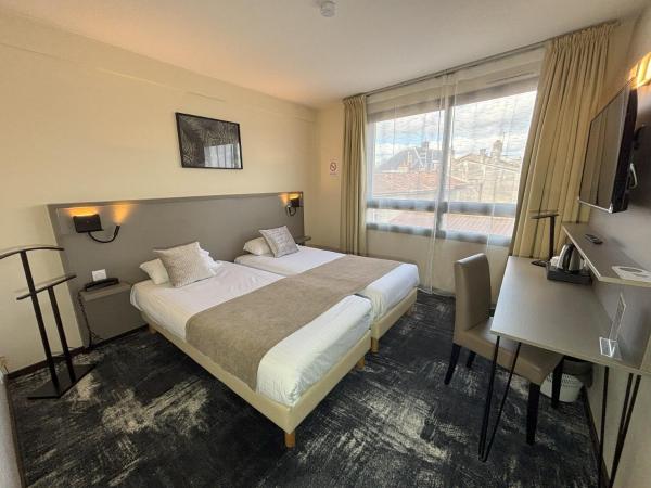 Hôtel Le Valois, Cognac Centre : photo 1 de la chambre chambre lits jumeaux standard