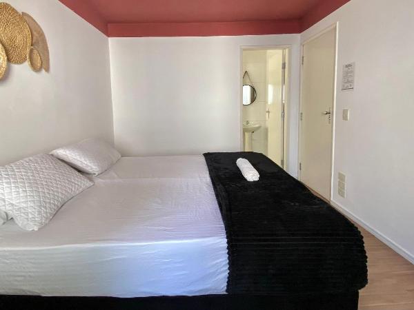 Pousada Santiago Morumbi : photo 10 de la chambre chambre quadruple avec salle de bains