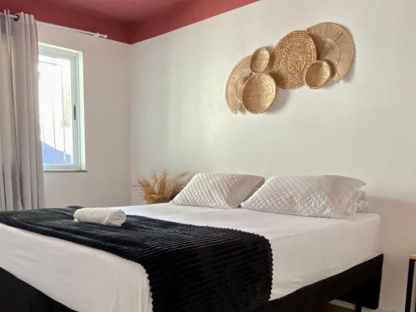 Pousada Santiago Morumbi : photo 1 de la chambre chambre quadruple avec salle de bains