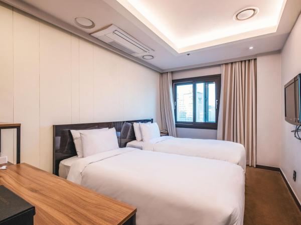 The Riverside Hotel : photo 1 de la chambre chambre lits jumeaux supérieure - vue sur ville