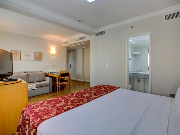 Quality Suítes Oscar Freire : photo 2 de la chambre studio lit king-size avec canapé-lit