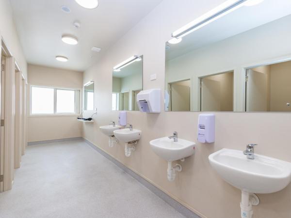 Rock Solid Backpackers Rotorua : photo 1 de la chambre lit dans un dortoir de 4 lits