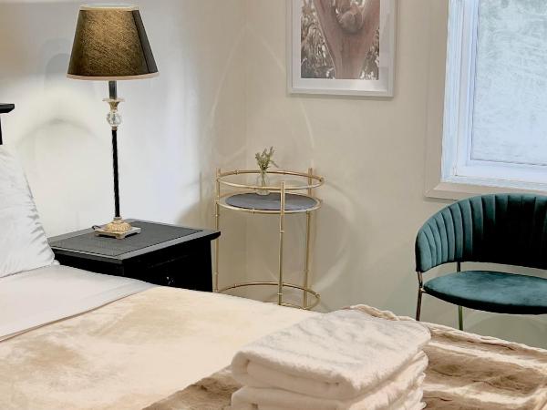 North Ryde Guesthouse : photo 2 de la chambre chambre lit queen-size avec salle de bains commune