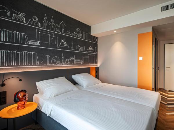 LOGINN Hotel Köln Airport : photo 4 de la chambre chambre lits jumeaux supérieure