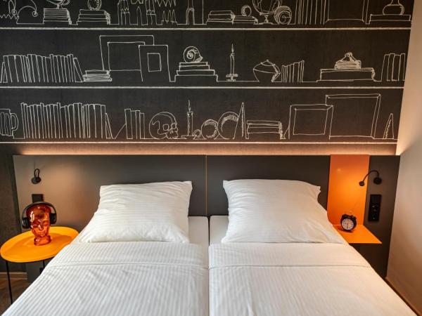 LOGINN Hotel Köln Airport : photo 3 de la chambre chambre lits jumeaux supérieure