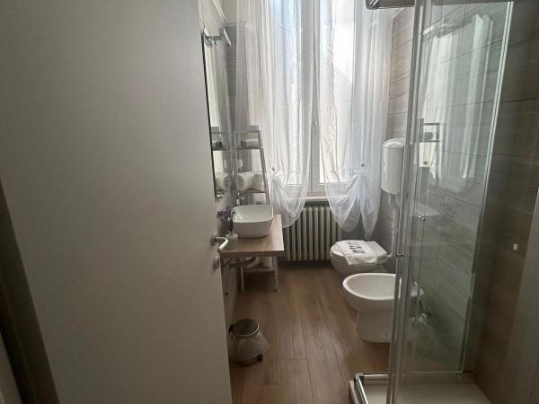 B&B Magnolia : photo 2 de la chambre chambre triple avec salle de bains privative