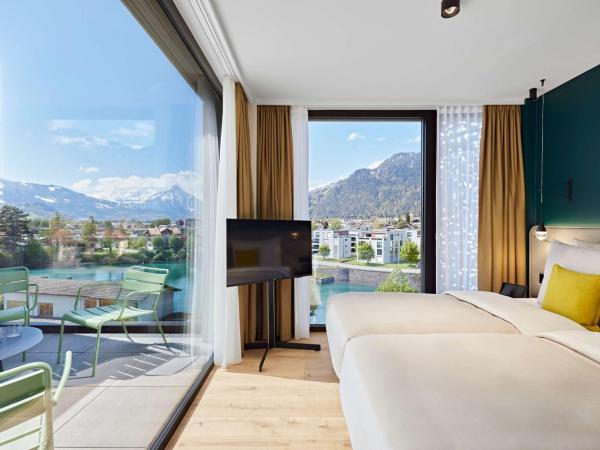 Essential by Dorint Interlaken - New Opening : photo 1 de la chambre suite junior avec terrasse