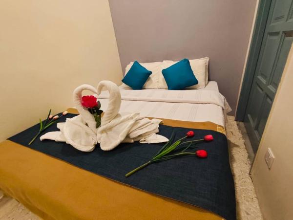 Homestay 5 minute walk to HUKM : photo 1 de la chambre chambre double