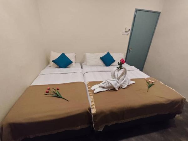 Homestay 5 minute walk to HUKM : photo 1 de la chambre chambre familiale deluxe