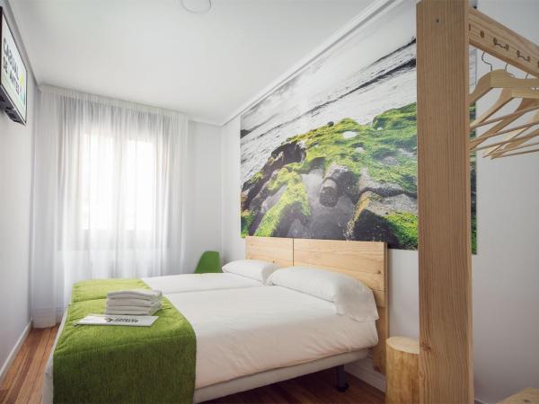 Casual Serantes : photo 2 de la chambre chambre lits jumeaux