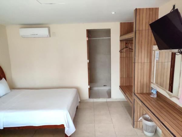 Ashly Boulevard : photo 2 de la chambre chambre double avec 2 lits doubles