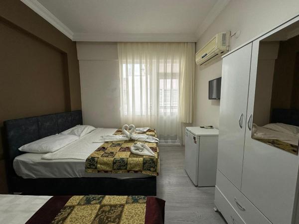 Palm City Hotel Alanya : photo 4 de la chambre chambre triple