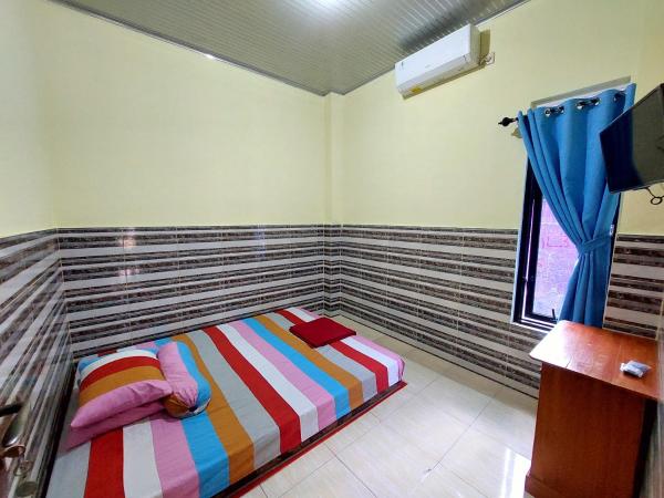 Griya Tugu Jogja Syariah : photo 4 de la chambre chambre double avec salle de bains commune