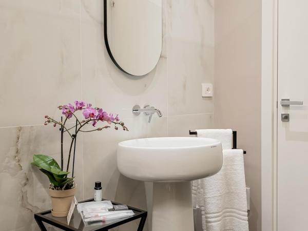 D & D Rooms : photo 2 de la chambre chambre deluxe double ou lits jumeaux