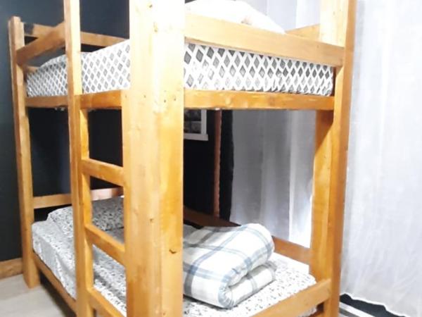 The International House Hostel : photo 9 de la chambre lit dans un dortoir de 4 lits