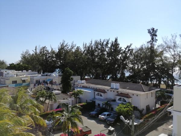 Citronella Villa Flic en Flac : photo 9 de la chambre appartement - vue sur mer