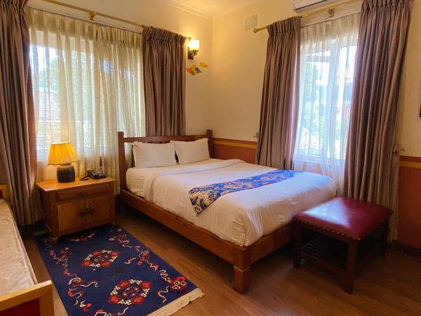 Three Jewels Boutique Hotel : photo 10 de la chambre chambre double ou lits jumeaux deluxe – vue sur jardin