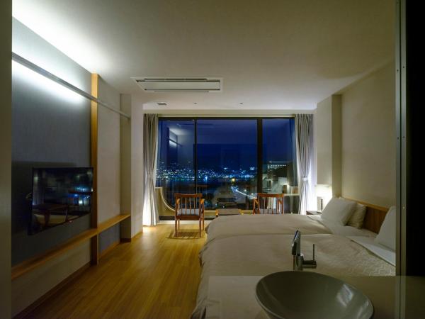 Inasayama Kanko Hotel : photo 3 de la chambre chambre lits jumeaux supérieure - vue sur mer