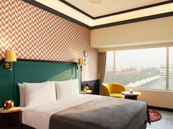 The Connaught, New Delhi- IHCL SeleQtions : photo 1 de la chambre chambre deluxe lit king-size - vue sur stade - 10 % de réduction sur nourriture et boissons sans alcool, 2 heures enregistrement anticipé ou départ tardif, happy hours (boisson achetée = boisson offerte) de 17h30 à 19h30 (sauf 14 février)