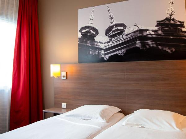 Comfort Aparthotel Saint-Etienne : photo 6 de la chambre chambre lits jumeaux - non-fumeurs