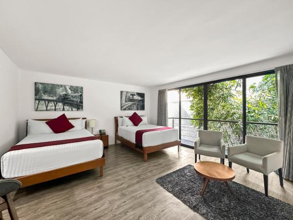 Armonik Suites By Casanevo : photo 7 de la chambre chambre deluxe avec 2 lits doubles