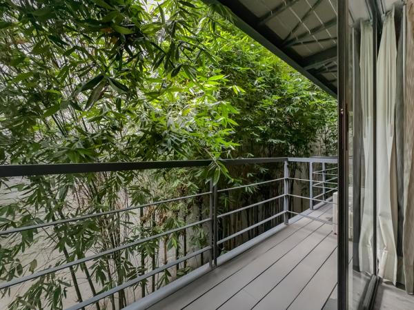 Armonik Suites By Casanevo : photo 4 de la chambre chambre deluxe avec 2 lits doubles