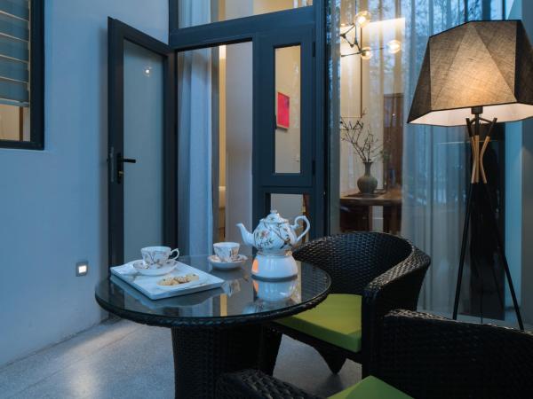 Wuyu Hotel Chongqing Yangjiaping The Mixc : photo 4 de la chambre chambre supérieure lit queen-size