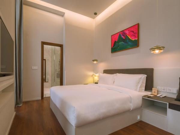 Wuyu Hotel Chongqing Yangjiaping The Mixc : photo 3 de la chambre chambre supérieure lit queen-size