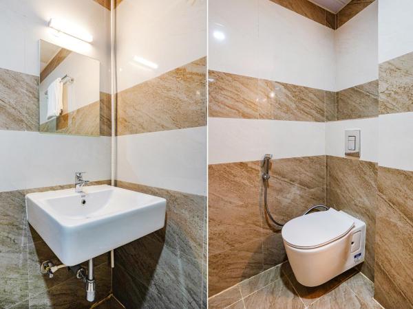 FabHotel Partha Residency : photo 1 de la chambre chambre deluxe