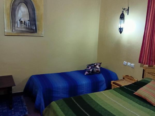 LESCALE DE OUARZAZATE : photo 1 de la chambre chambre triple - vue sur jardin