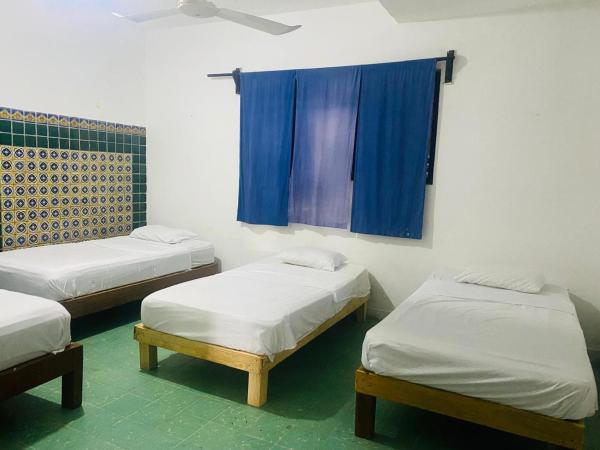 Hotel & Hostal Mayflower : photo 3 de la chambre bungalow familial