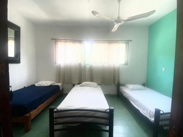 Hotel & Hostal Mayflower : photo 4 de la chambre bungalow familial