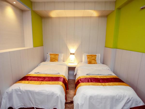 Hotel Pomelo House Inn : photo 3 de la chambre chambre familiale deluxe